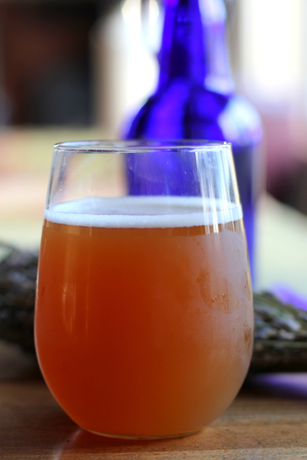 Glass of homemade lavender kombucha