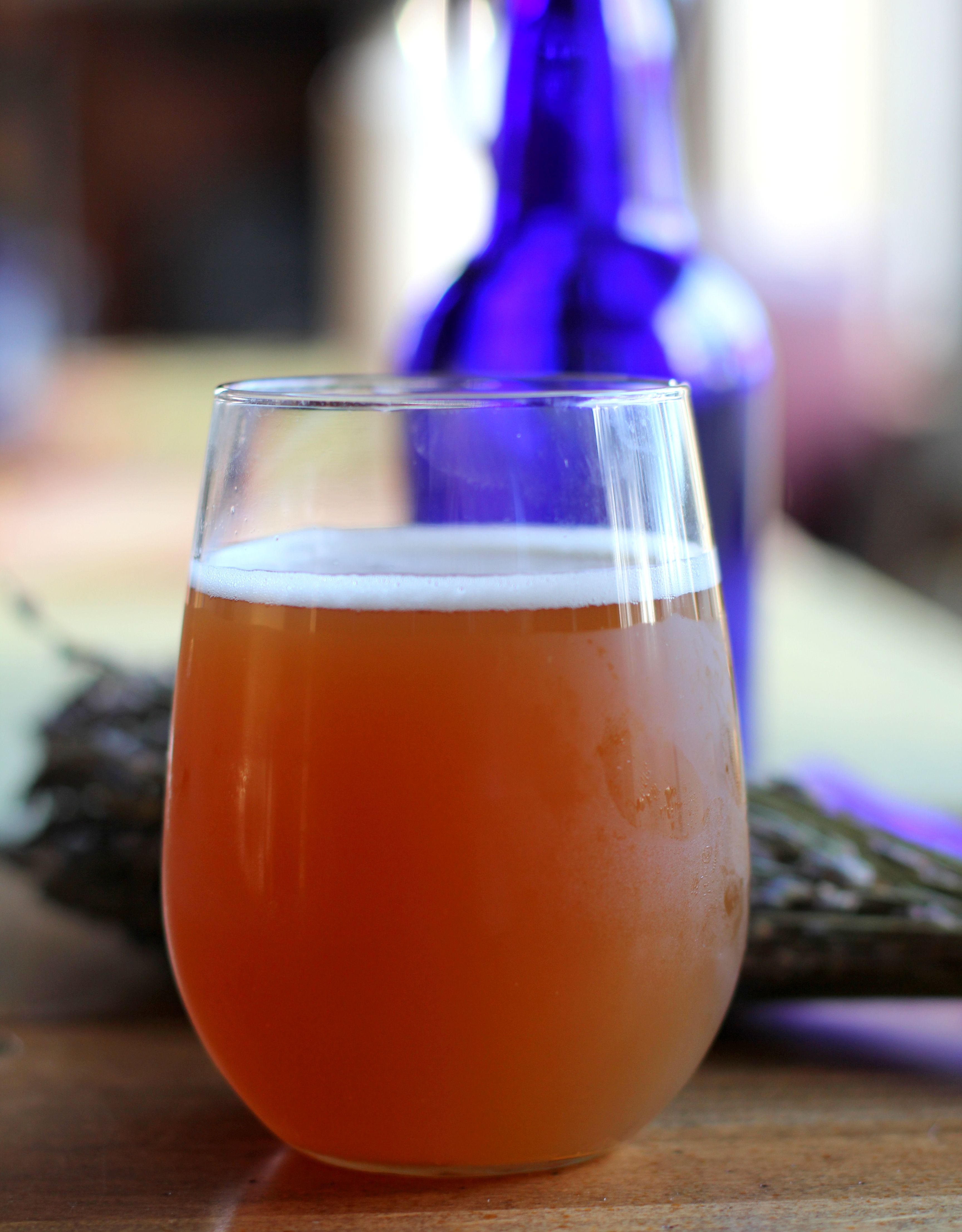 Glass of homemade lavender kombucha