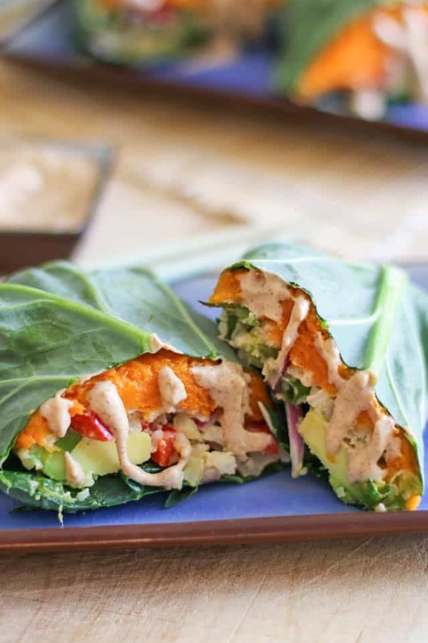 Roasted Sweet Potato and Cauliflower Rice Collard Wraps with avocado and almond ginger sauce - these healthy vegan wraps are perfect for lunch!