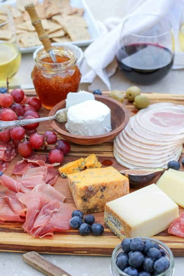 How to Make a Charcuterie Board - tips for selecting meat, wine and cheese pairings, as well as incorporating seasonal ingredients
