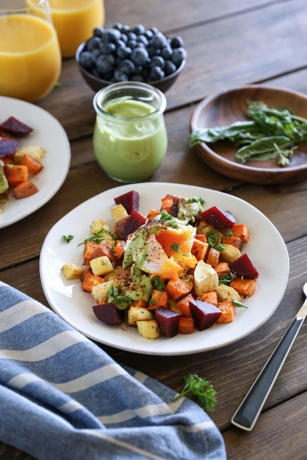 Paleo Eggs Benedict with Avocado Hollandaise with roasted root vegetables - a cleaner take on the classic brunch recipe