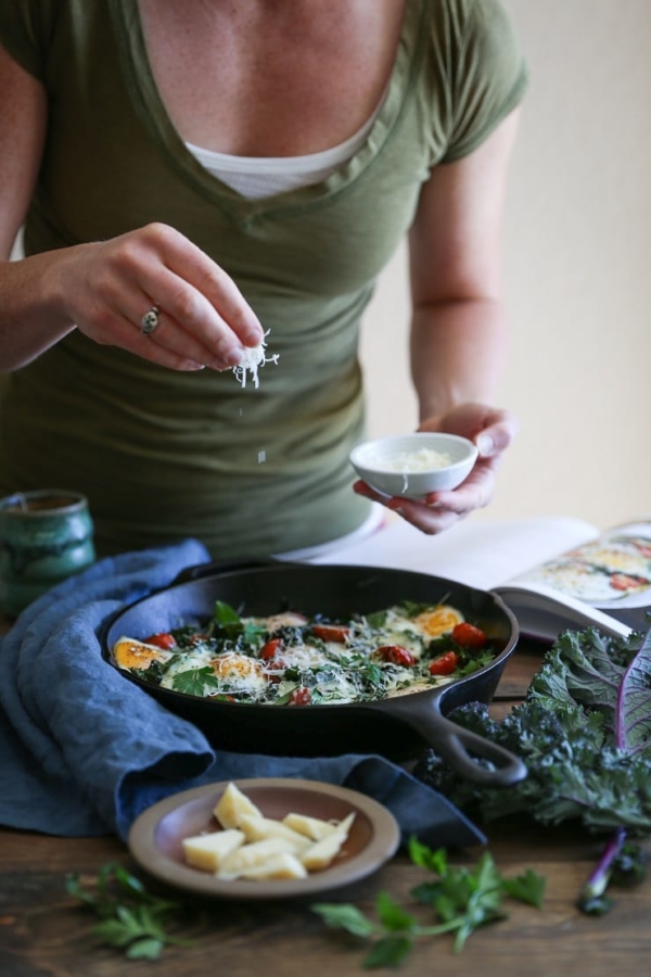 Tomato, Kale, and Parmesan Baked Eggs - a nutritious vegetarian breakfast that requires only a few ingredients.