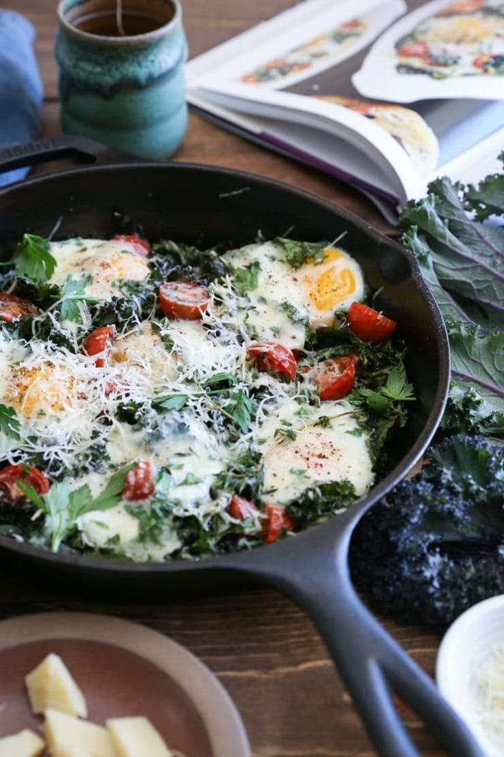 Tomato Kale and Parmesan Baked Eggs - The Roasted Root