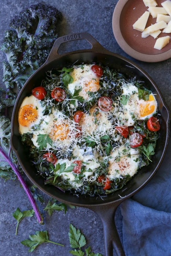 Tomato Kale and Parmesan Baked Eggs - The Roasted Root