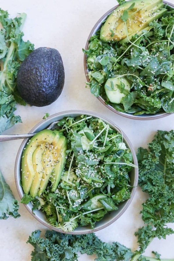 Vegan and Paleo Raw Power Bowls with broccoli, kale, spinach, cucumber, avocado, and more!