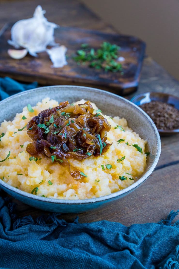 Mashed Rutabaga with Caramelized Onions - a lower-carb, more nutritious alternative to mashed potatoes | TheRoastedRoot.net #healthy #lowcarb #glutenfree #paleo