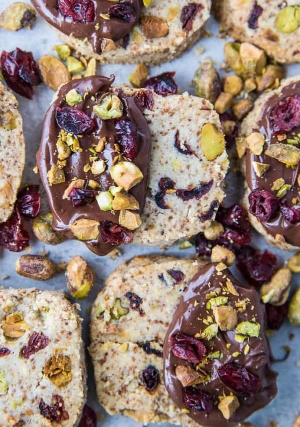 Cranberry Pistachio Vegan Shortbread Cookies - paleo, grain-free, dairy-free, refined sugar-free and absolutely delicious! These are the perfect Christmas cookie and are amazing when dipped in chocolate