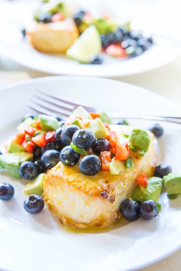 Orange Ginger Halibut with Blueberry Avocado Salsa - a baked halibut recipe that is easy to prepare and so flavorful! A healthy dinner recipe - paleo, whole30, low-carb | TheRoastedRoot.net