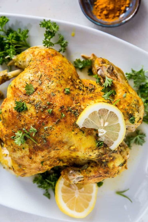 How to Make Rotisserie Chicken in the Instant Pot - a quick and easy recipe for mouth-watering tender chicken | TheRoastedRoot.net