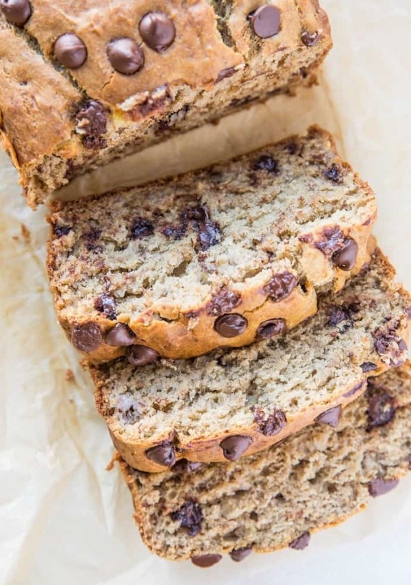 The BEST Moist Gluten-Free Banana Bread sweetened with coconut sugar - a delicious perfectly fluffy chocolate chip banana bread recipe | TheRoastedRoot.net