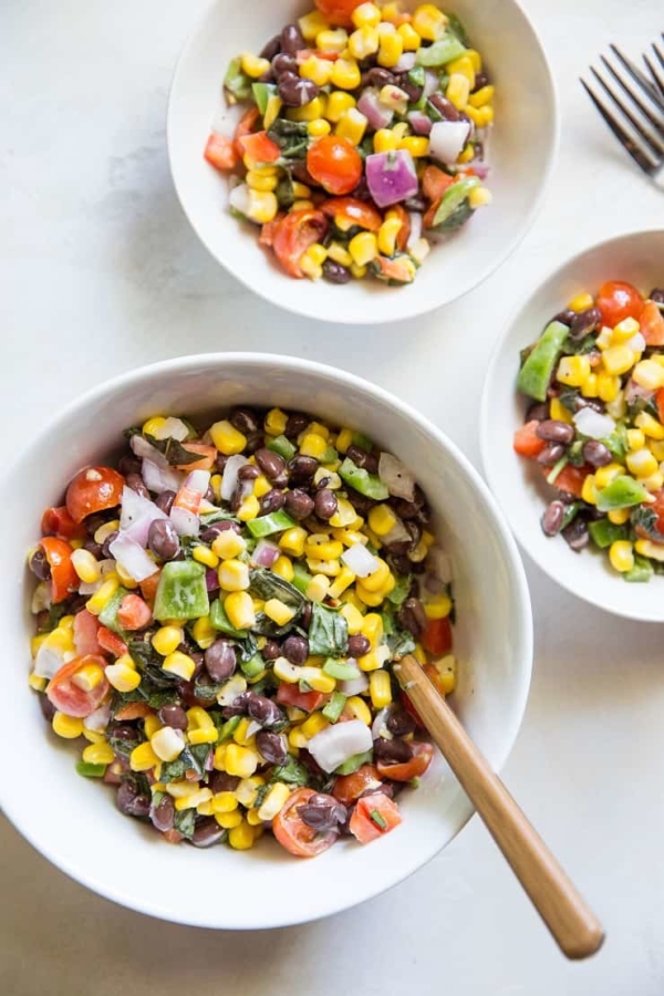 1 large and two small bowls of black bean corn salad