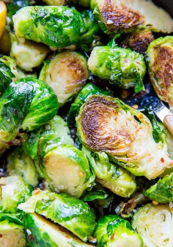 Sauteed brussel sprouts recipe with garlic and butter. This quick and easy brussel sprout recipe is low-carb, keto, paleo, will be a home run with your friends and family each and every time!