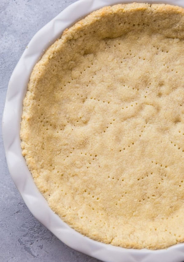 Almond Flour Pie Crust - keto, paleo, grain-free, dairy-free, and delicious! This pie crust recipe holds together very well and tastes just like regular pie crust