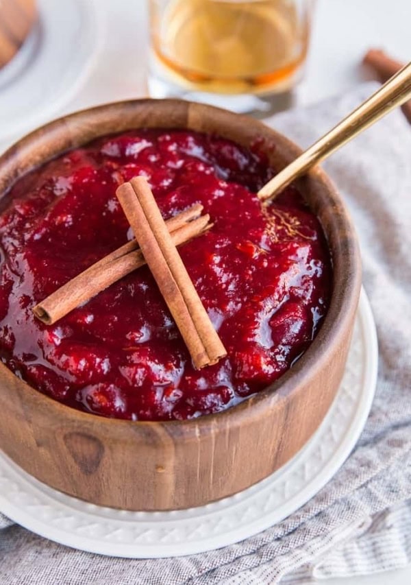 Maple Bourbon Cranberry Sauce with cinnamon and orange zest - a flavorful unique approach to homemade cranberry sauce for your Thanksgiving feast!