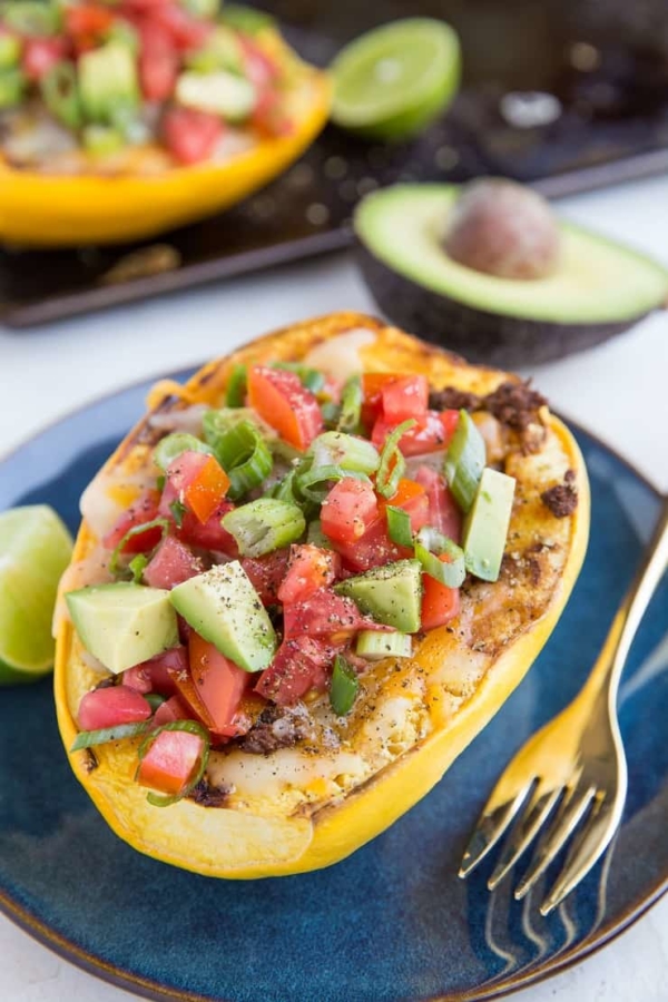 Spaghetti Squash Burrito Bowls with ground beef, cheese, tomatoes, avocado and more. An easy, healthy low-carb, keto dinner recipe.