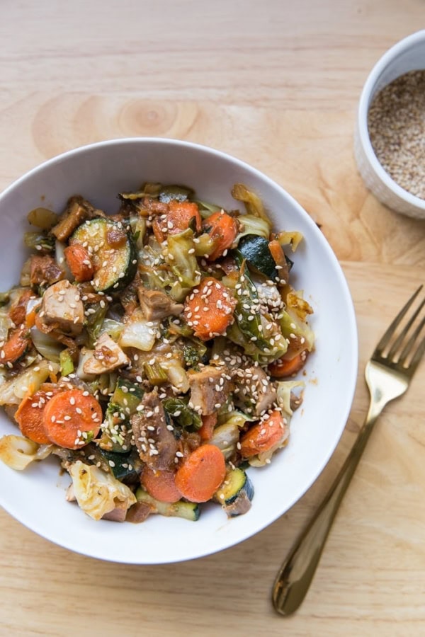 Chicken Egg Roll in a Bowl with vegetables - a healthy dinner recipe with marinated chicken, cabbage, ginger, garlic, carrots, and zucchini