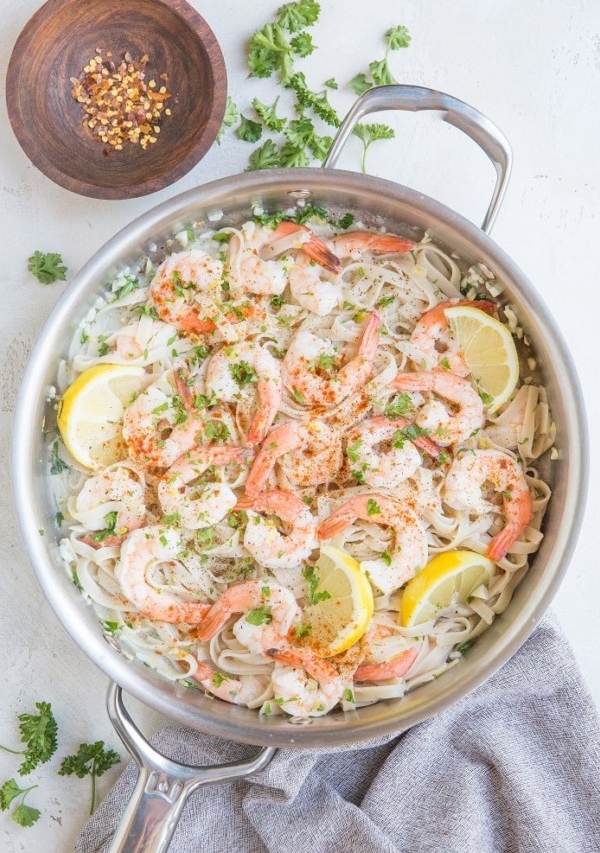 Easy Lemon Garlic Shrimp Pasta with a creamy dairy-free sauce. Zesty, creamy, garlicky PERFECT pasta for an amazing romantic meal!