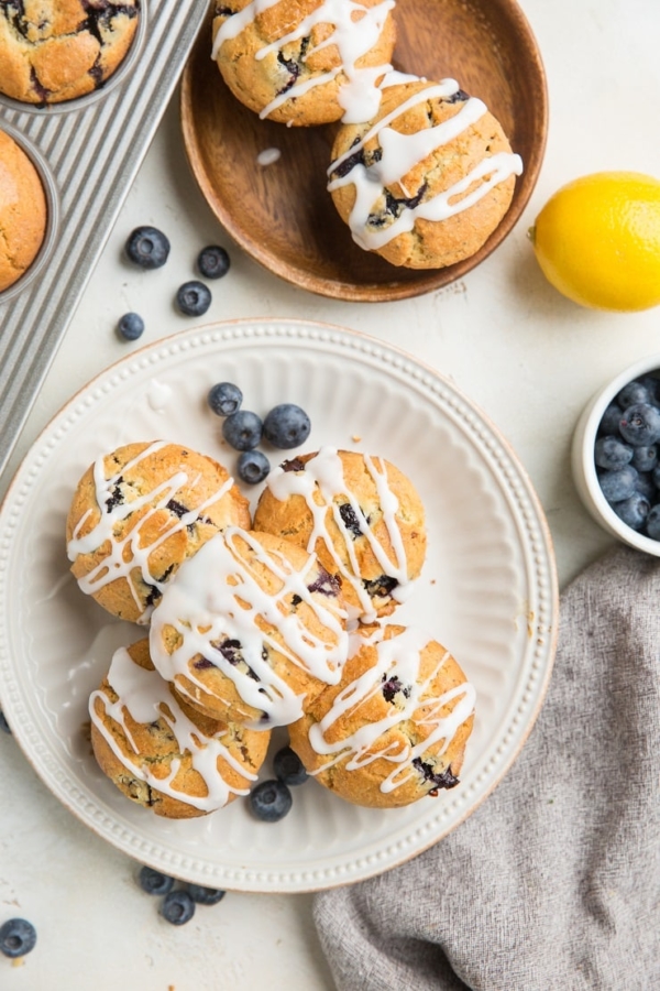 Keto Lemon Poppy Seed Blueberry Muffins made with almond flour - grain-free, sugar-free, insanely moist and fluffy! You'd never guess these muffins are gluten-free and sugar-free!