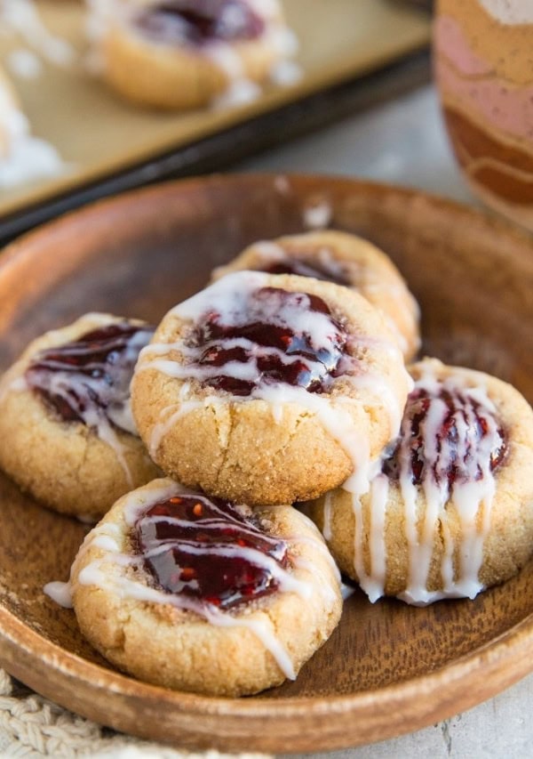 Keto Raspberry Thumbprint Cookies (Vegan, dairy-free, grain-free, egg-free) - these easy thumbprint cookies are a lovely gluten-free Christmas dessert!