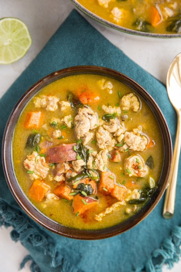 Ground Turkey Sweet Potato Soup with spinach, turmeric, and ginger. Creamy, filling, clean soup recipe with nutrient-packed foods