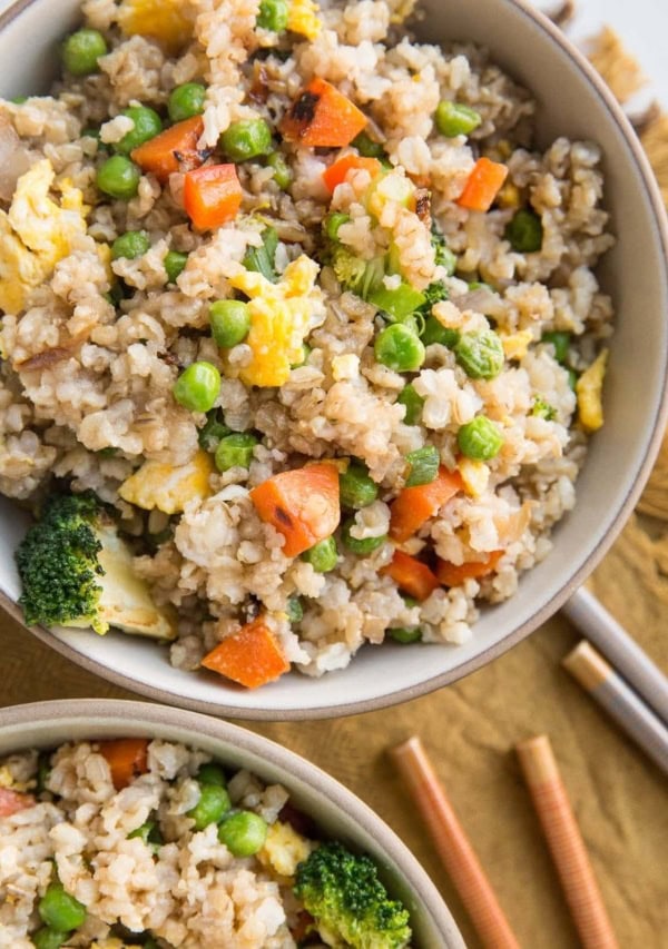 Vegetable Fried Rice with broccoli, bell pepper, peas, and carrots. a veggie-loaded rice experience