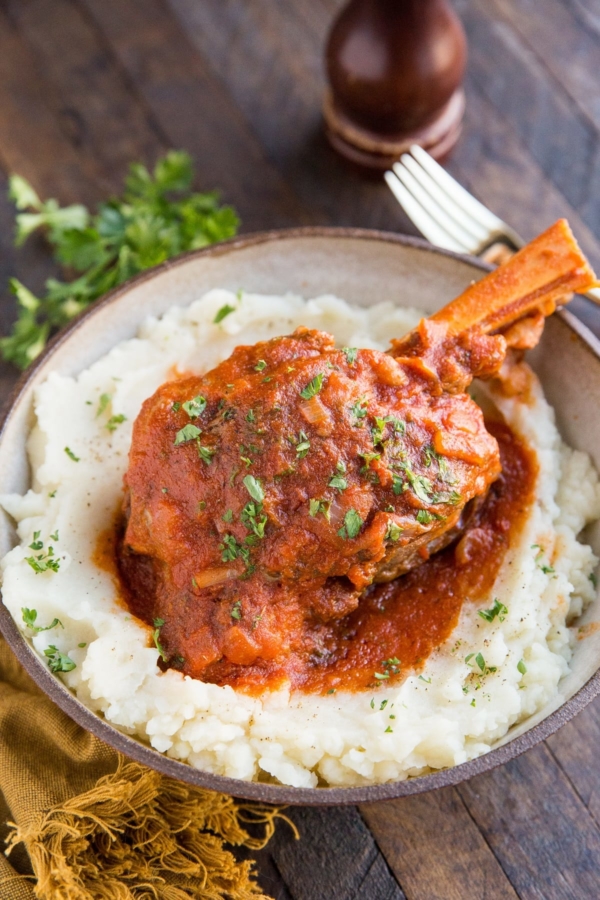 Instant Pot Lamb Shanks - an easy method for braising lamb shanks in a delicious tomato based sauce.
