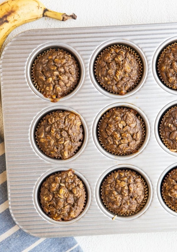 Muffin tin with banana baked oatmeal muffins