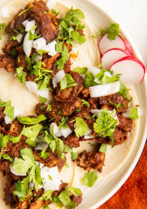 Plate of al pastor tacos