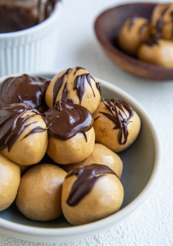 protein balls recently drizzled with chocolate