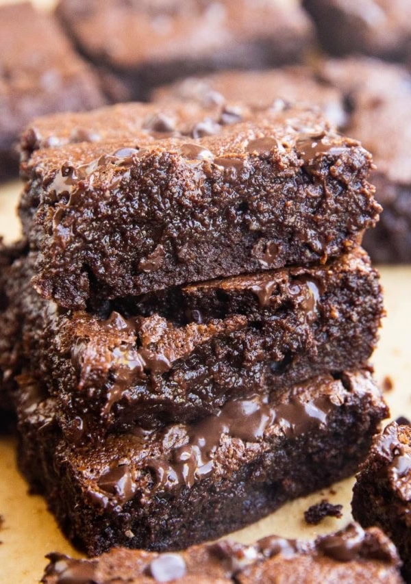 close up image of a stack of almond flour brownies