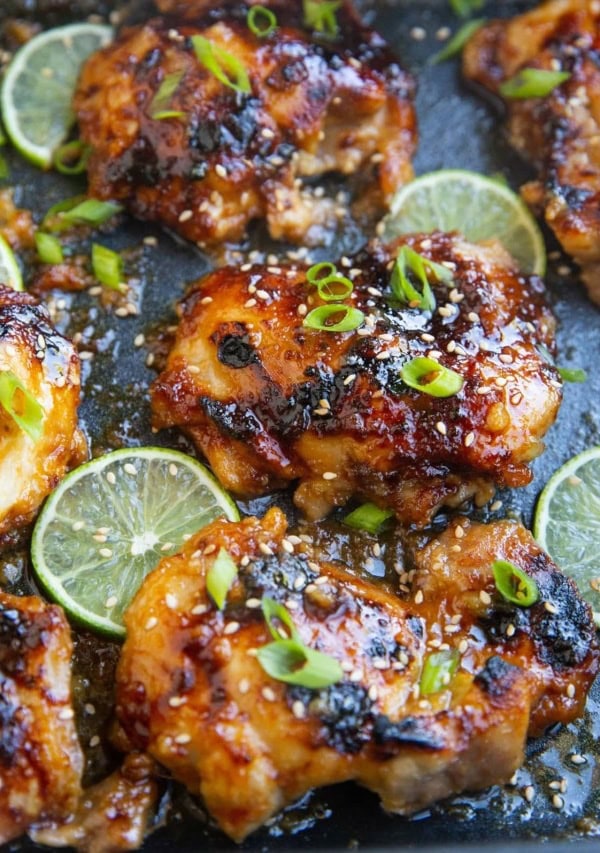 photo of honey lime chicken thighs all sticky and delicious in a casserole dish