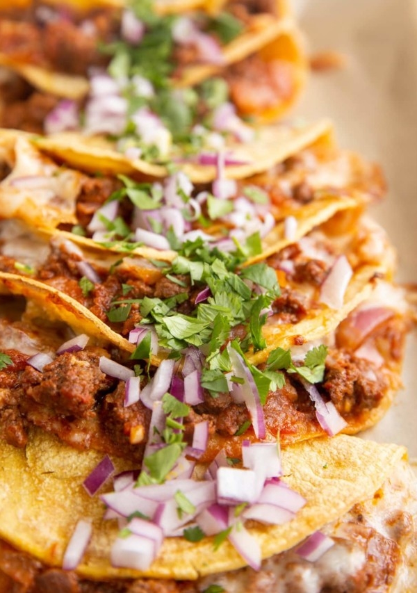 Crunchy ground beef tacos on a serving tray, ready to serve.