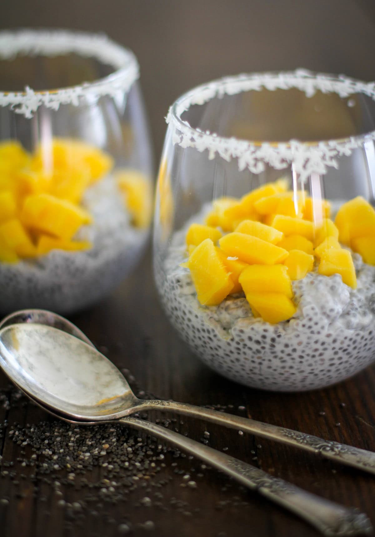 Two glasses filled with coconut chia seed pudding.