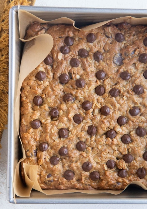 Peanut Butter Oatmeal Chocolate Chip Cookie Bars in a baking dish, fresh out of the oven.