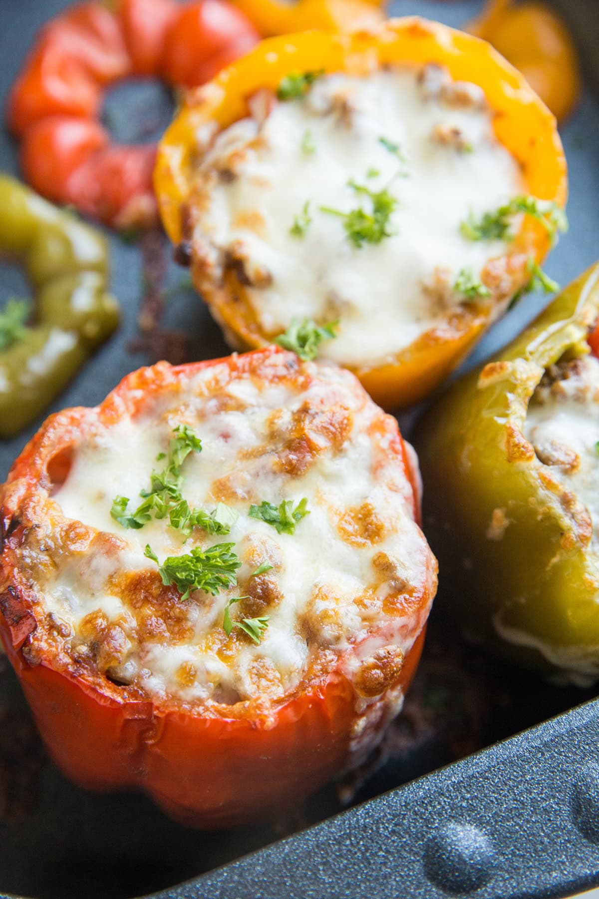 Easy Stuffed Bell Peppers made with just 10 basic ingredients! A quick and tasty dinner recipe that is filling and delicious.