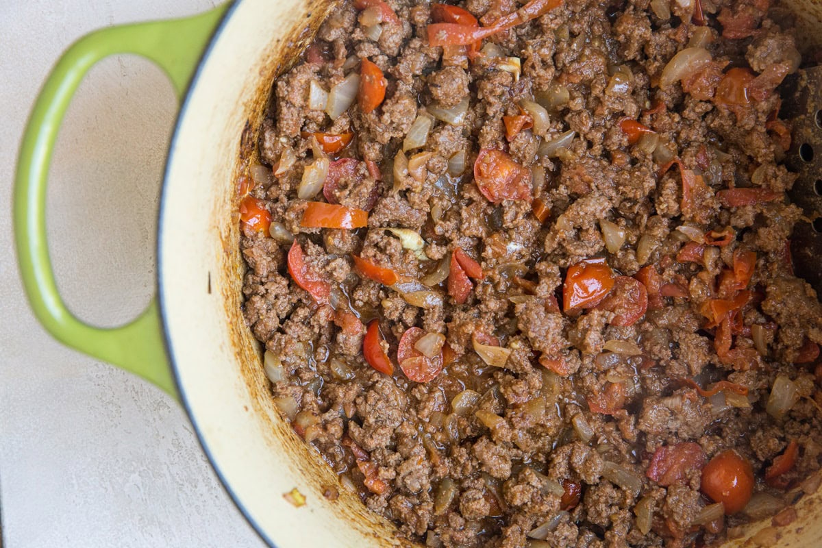 Ground beef stuffing in a large pot, ready to use.