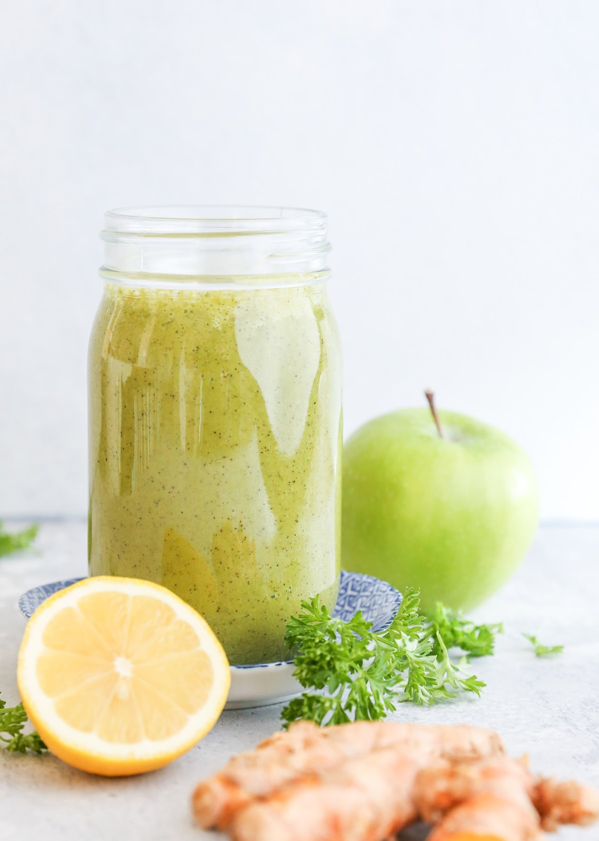 Liver Detox Smoothie with apple, spinach, parsley, turmeric, and more! This nutritious smoothie is a great tool for cleansing!