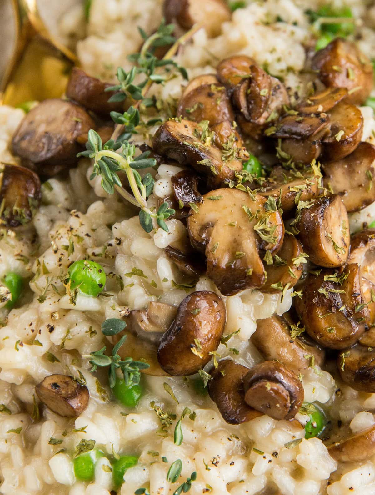 Mushroom Risotto Recipe with onion, garlic, and peas. Dairy-free healthy side dish