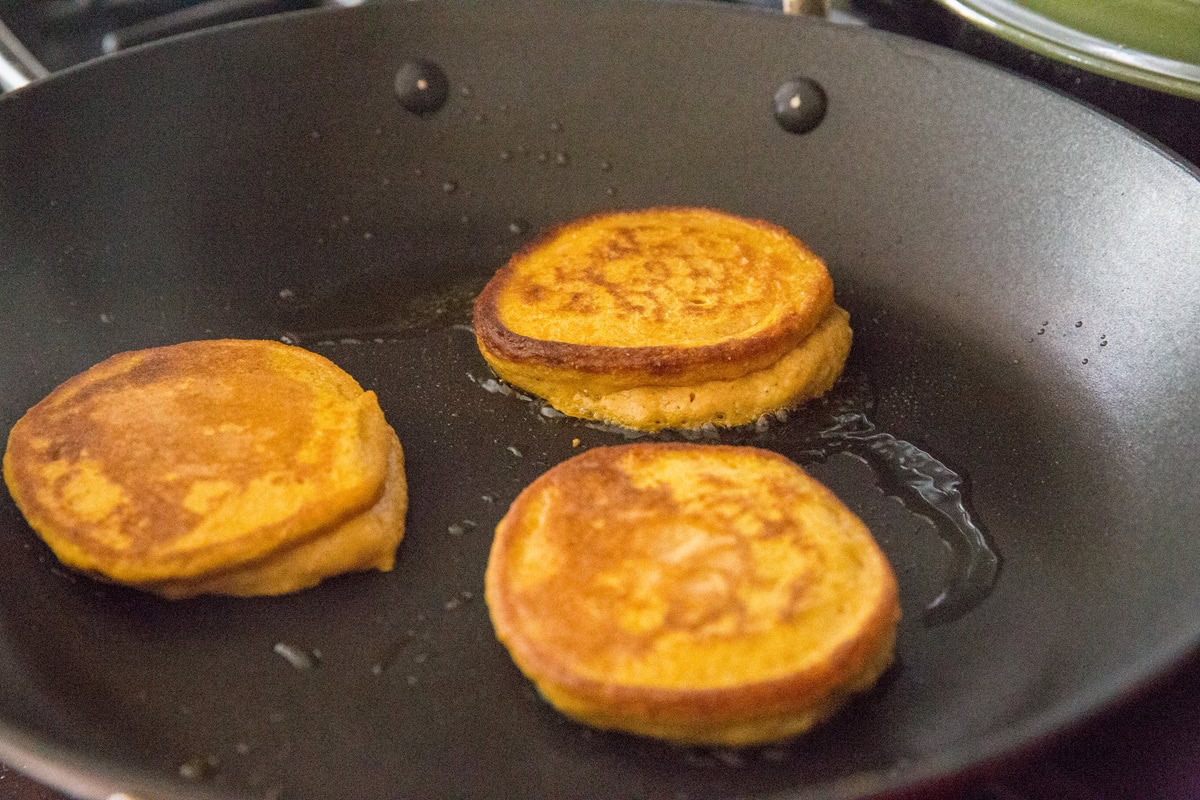 Pumpkin pancakes in a skillet