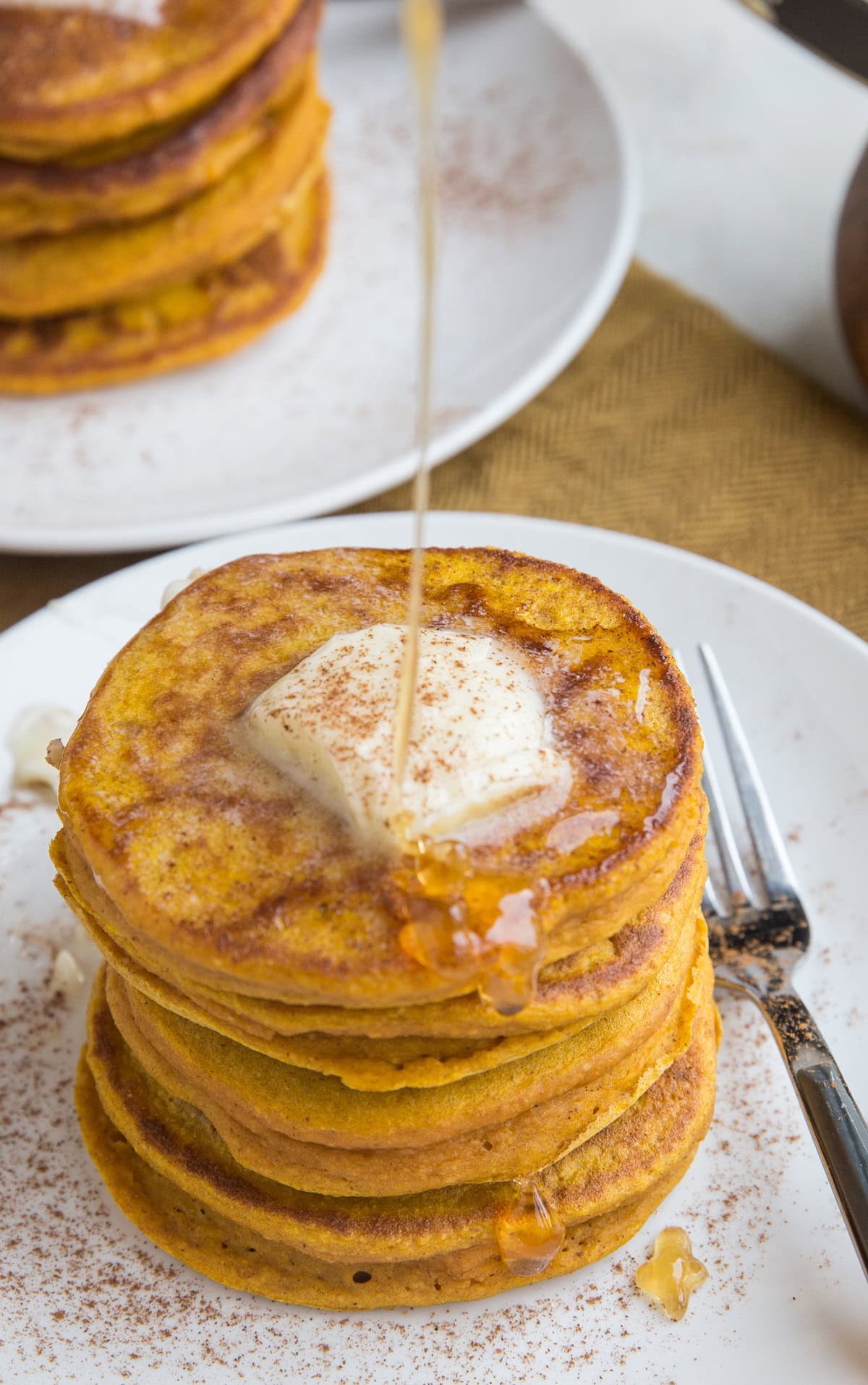 Gluten-Free Protein Pumpkin Pancakes made flourless with oats and dairy-free. Gluten-free and delicious!