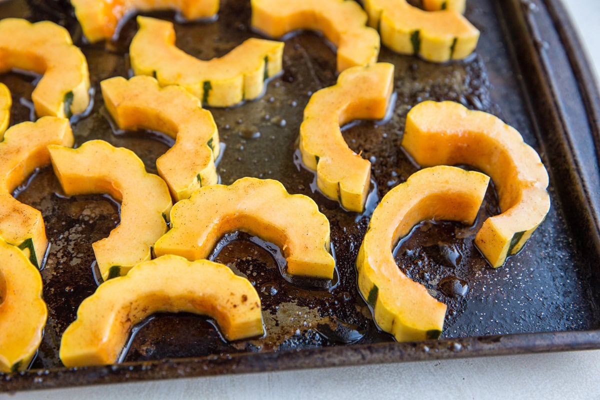 Maple Roasted Delicata Squash - cut the delicata squash in half