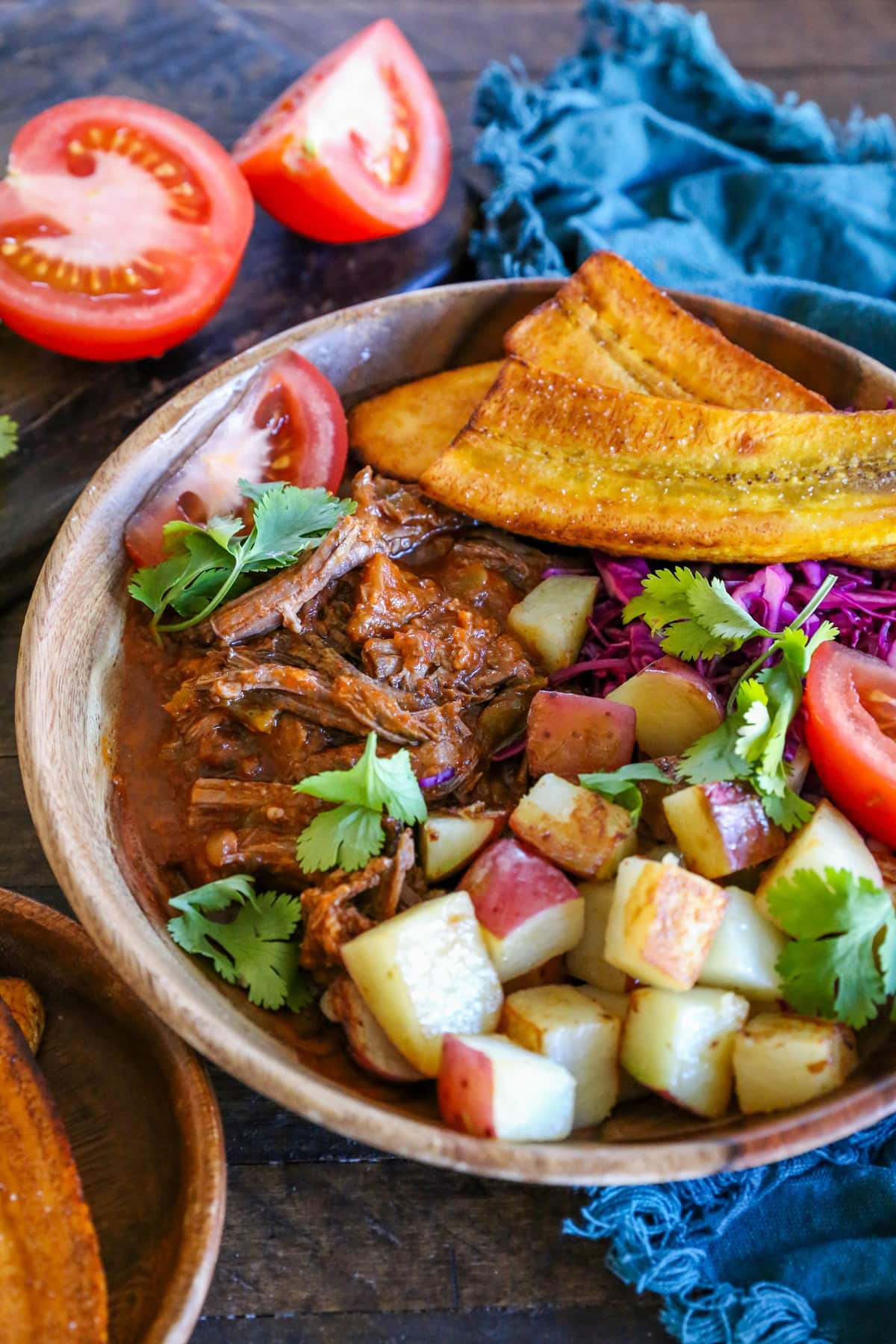 Slow Cooker Ropa Vieja (Cuban Shredded Beef) with Instant Pot instructions. This delicious flavorful dish is paleo, whole30, and versatile! | TheRoastedRoot.net #glutenfree