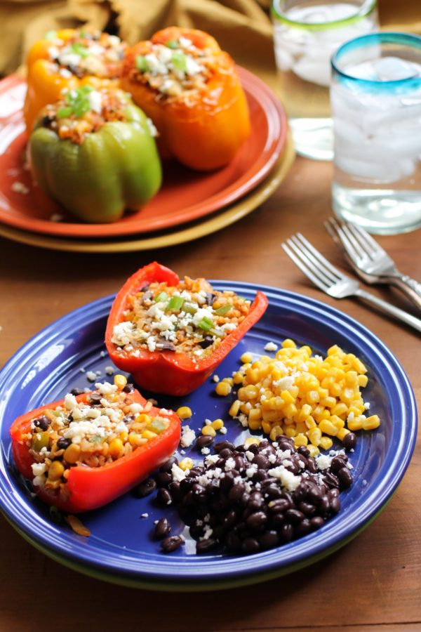Stuffed bell peppers on a plate, cut in half