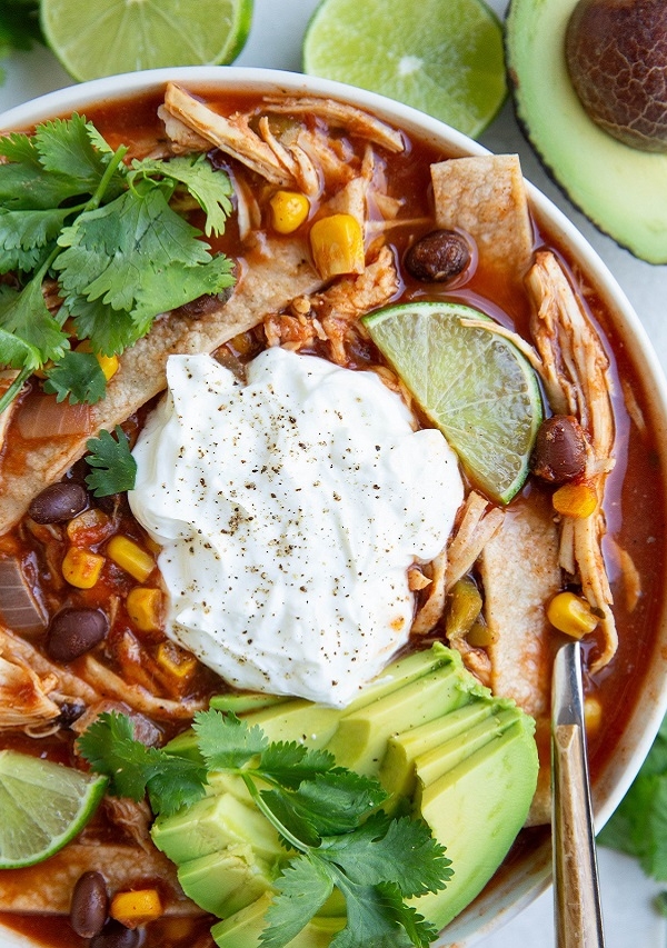 Big white bowl of chicken tortilla soup