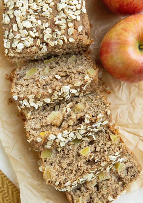 Loaf of healthy apple bread cut into slices.