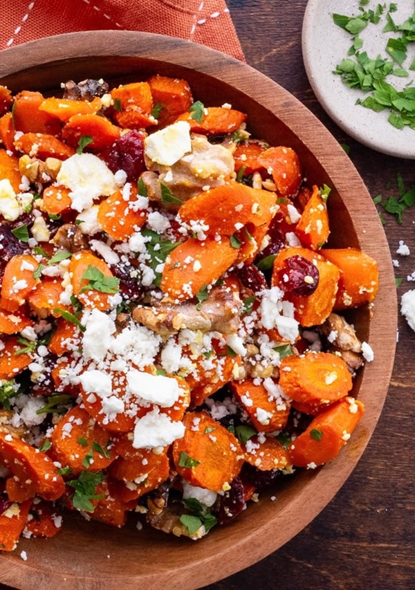 WOODEN BOWL OF MAPLE ROASTED CARROTS