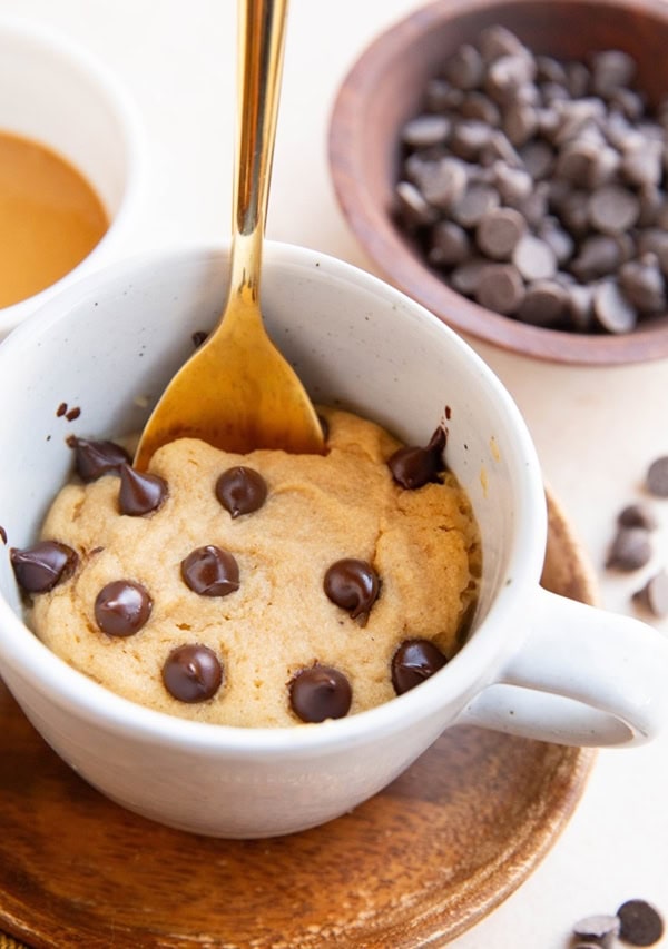 Mug with peanut butter mug cake inside.