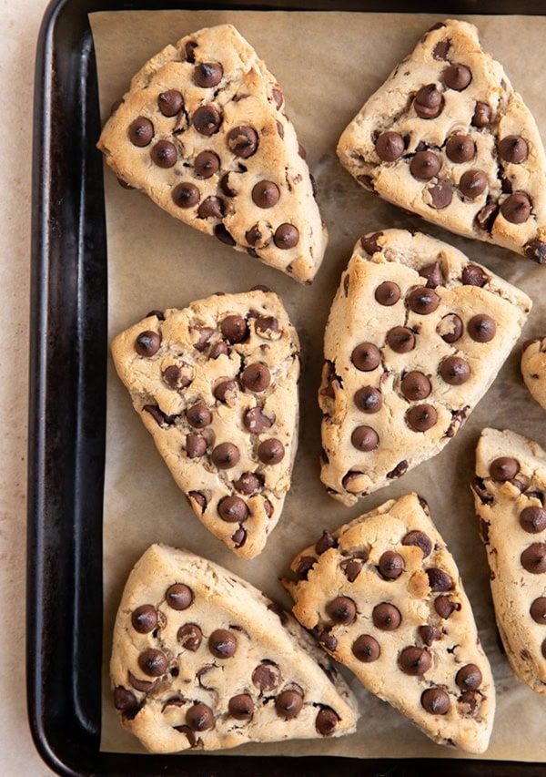 Baking sheet of gluten-free scones with chocolate chips