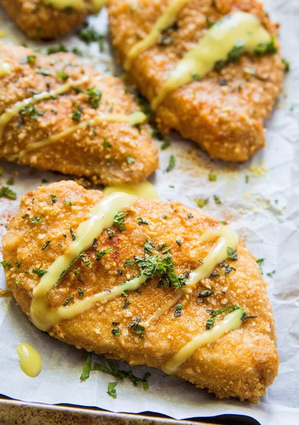 Gluten-Free breaded baked chicken on a sheet pan, ready to eat.