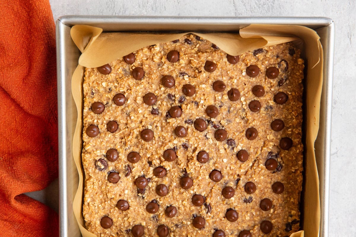 Chocolate chip applesauce bars in a baking dish, fresh out of the oven.